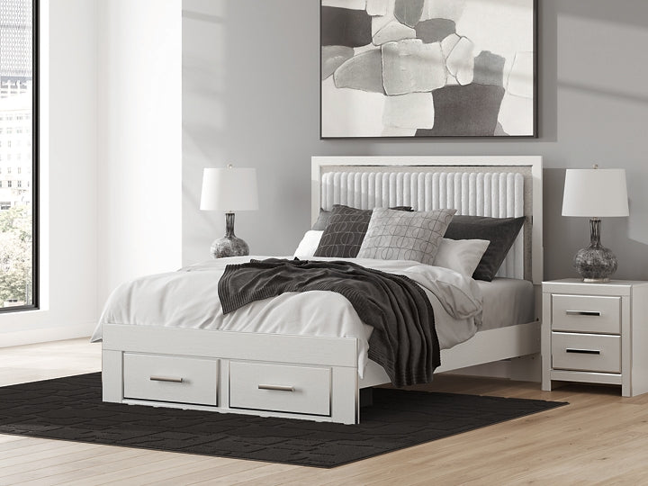 Zuraleus Queen Upholstered Panel Storage Bed