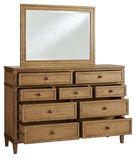 Sharlance California King Upholstered Panel Bed with Mirrored Dresser and Chest