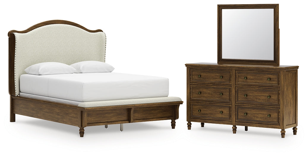 Sturlayne Queen Upholstered Panel Bed with Mirrored Dresser