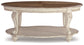 Realyn Oval Cocktail Table