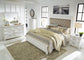 Kanwyn Queen Panel Bed with Mirrored Dresser