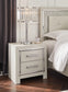 Zyniden Queen Upholstered Panel Bed with Mirrored Dresser and Nightstand