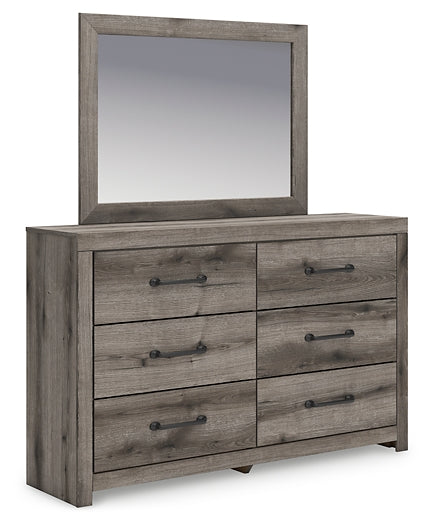 Graystorm King Panel Bed with Mirrored Dresser, Chest and Nightstand