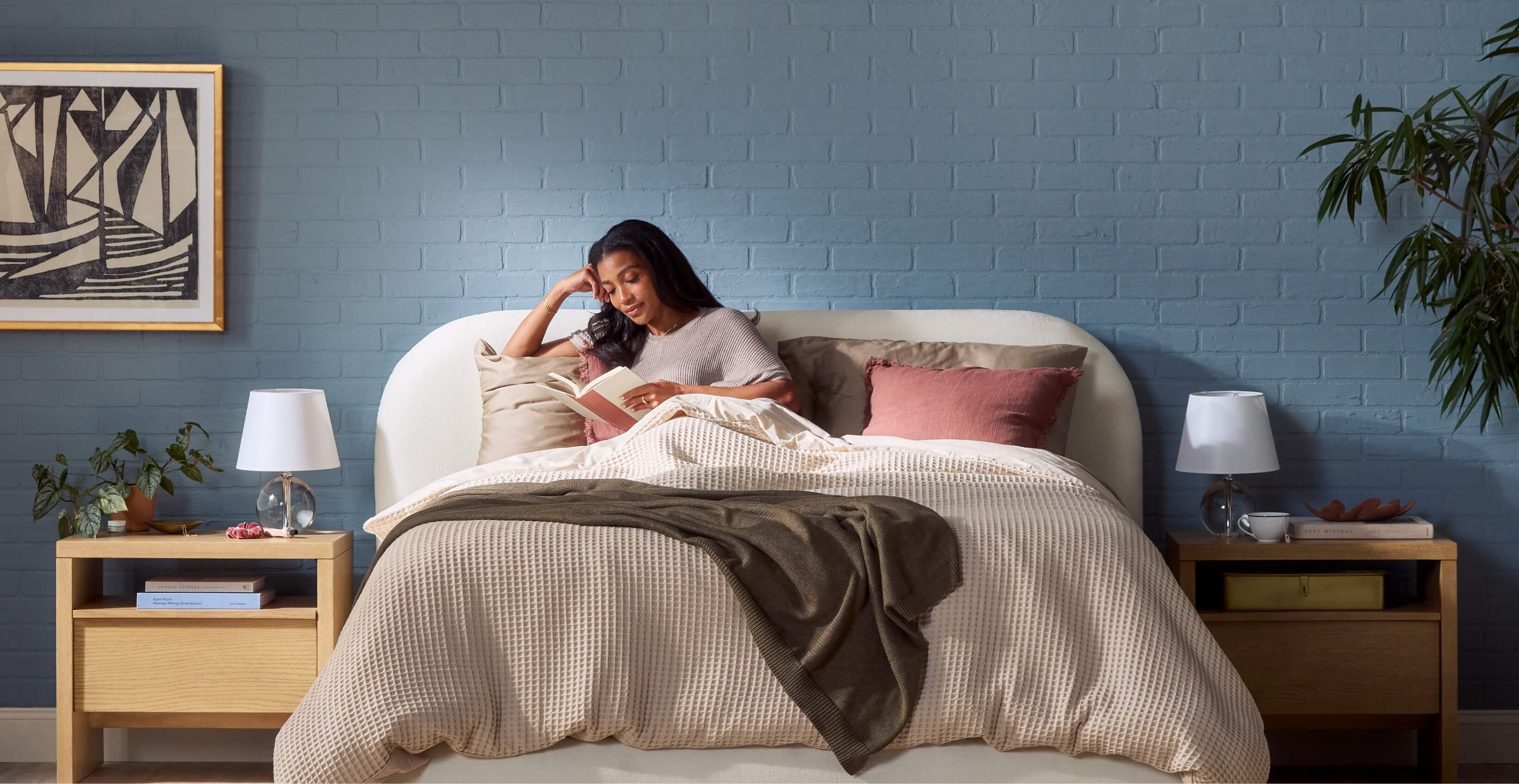 Woman reading in bed